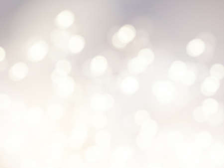 Vector bokeh background. Festive defocused white lights. Abstract blurred illustration.のイラスト素材