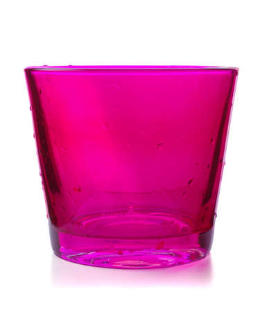 Pink glass with drops on a white backgroundの写真素材
