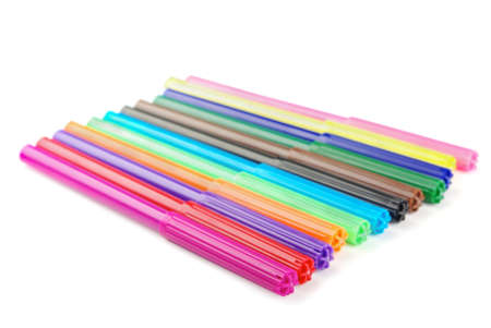 Row of colored felt tip pens on a white background