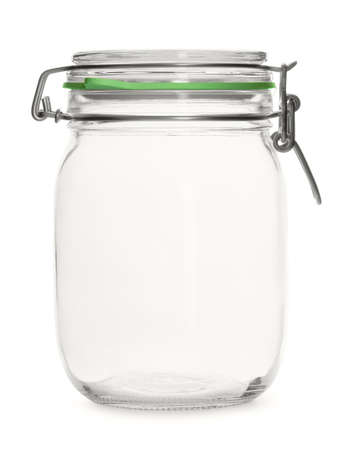 Glass empty threaded jar on a white backgroundの写真素材