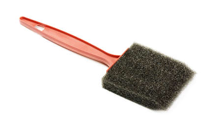 Foam brush with plastic handle isolated on a white background