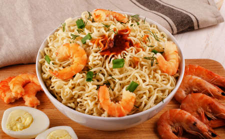Rice noodles with shrimps close-up on the table top view of a horizontalの写真素材