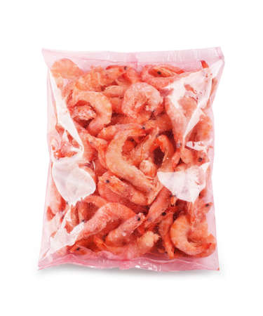 Frozen shrimp or prawn in plastic package isolated on a white backgroundの写真素材