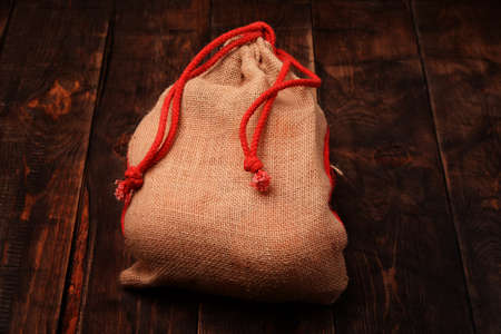 Fruit bag on a black wooden background の写真素材