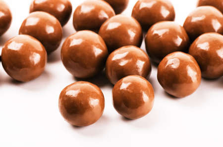 Chocolate balls on a white background close-upの写真素材