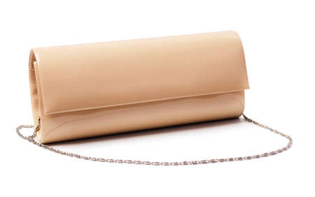 Beige clutch bag with chain isolated on white backgroundの写真素材