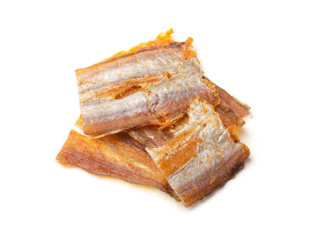 Dried fish fillets isolated on a white backgroundの写真素材