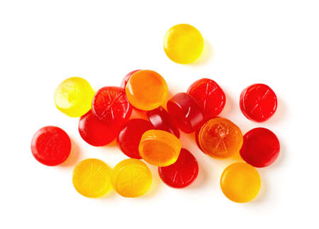 Colorful fruit hard candy isolated on white background top viewの写真素材