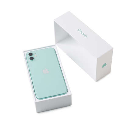 Moscow, Russia - April 20, 2020: Green Apple iPhone 11 with box isolated on a white background....