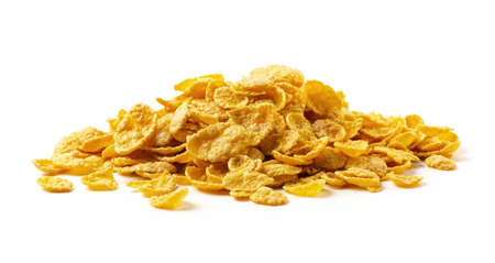 Corn flake cereal in a pile isolated against a white background
