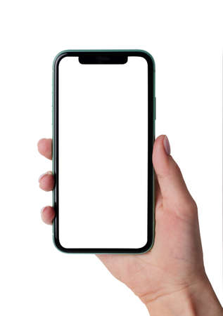 Moscow, Russia - June 18, 2020: Green Apple iPhone 11 mock up in a female hand isolated on a white background. Close-up of a new smartphone from Apple in a female hand.のeditorial素材