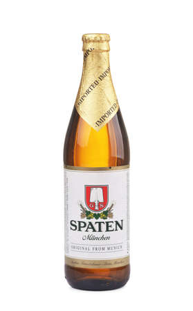 SAMARA, RUSSIA - DECEMBER 17, 2020: A bottle of Spaten Lager isolated on white background. The Spaten-Franziskaner-Brau GmbH is a brewery in Munich, Germany.のeditorial素材
