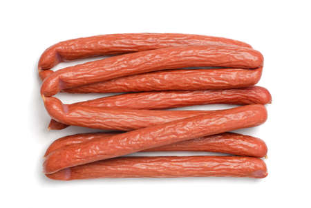 Stack of smoked sausages isolated on a white background, top view