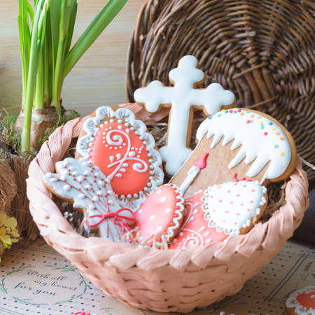 Easter gingerbread cookie bunnies with bucket of speckled Easter eggs
