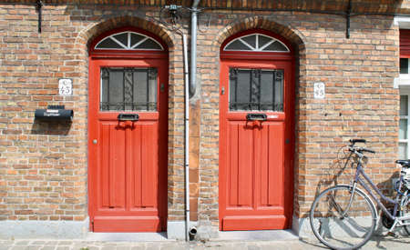 Little medieval house red doorsの写真素材