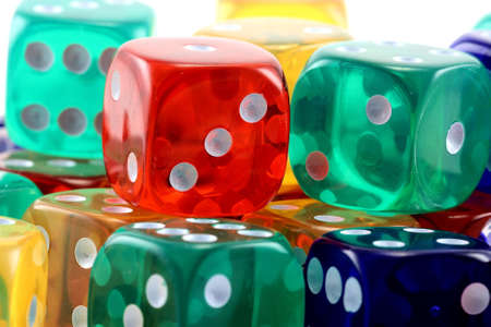 Close up of many colored dice in a pile
