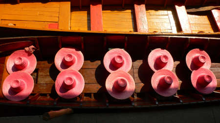 Red cap on boatの写真素材