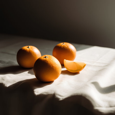 Oranges on a white tablecloth, selective focus, copy spaceの素材