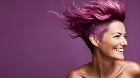 Portrait of a beautiful woman with pink hair on a purple backgroundの素材