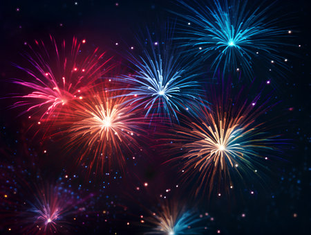 Colorful fireworks on night sky background. New Year celebration concept.の素材