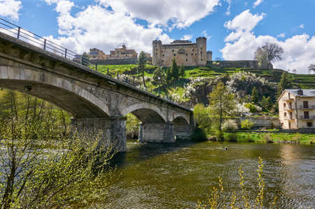 A view of the Historic town of Puebla de Sanabria from the Tera river shoreの写真素材
