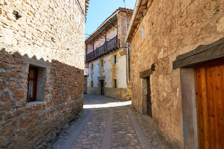 A nice street in the centre of the town of Orbaneja del Castilloの写真素材