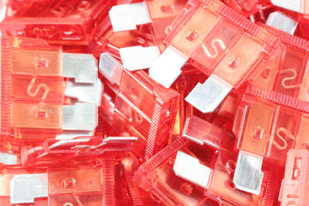 Car fuse. Pile od colorful electrical automotive fuses or circuit breaの写真素材