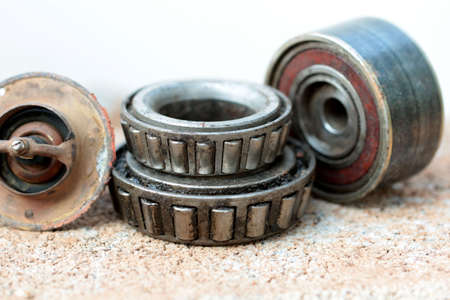 Old and rusty ball bearing, isolated on white backgroundの写真素材