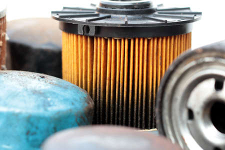 Close up old and dirty car oil filter, automotive maintenance serviceの写真素材
