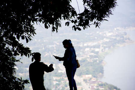 Young female traveler with mobile phone in handの写真素材