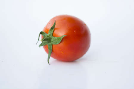 Tomato on the white isolatd background.の写真素材