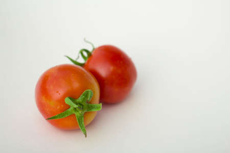 tomatoes Isolated on white background (tomato)の写真素材