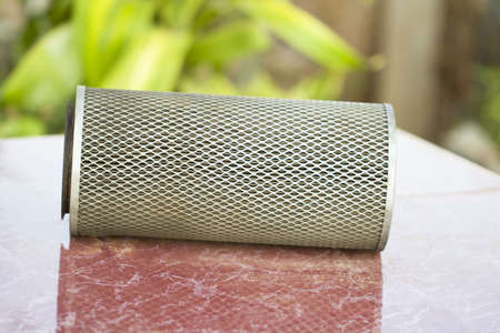 close up of Used and dirty automobile air filter
