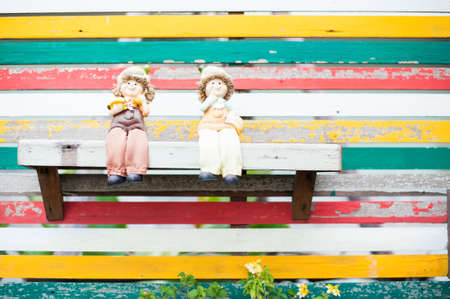 old wooden wall painted in different colorsの写真素材