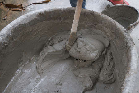 Mixing a cement in salver for applying construction
