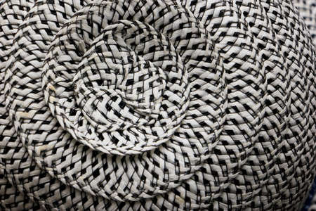 spiral pattern on lady hat woven