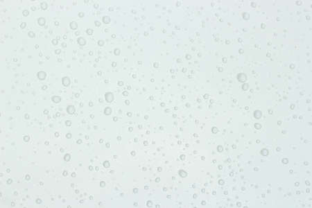 Water drop on white roof car, white backgroundの写真素材