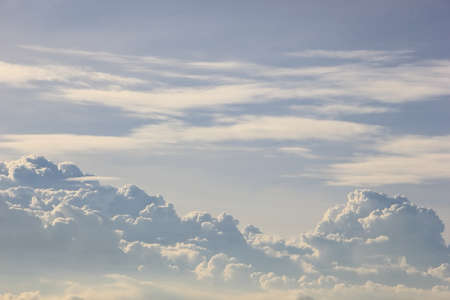 Dramatic sky with many white cloudの写真素材