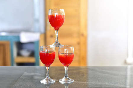 A beautifully decorated welcome drink or fruit juice of Prosecco fruit punch with oranges and mint leaves inside serves as a welcome drink at any party, reception, wedding or banquet. selected focusの写真素材