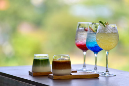 coffee menu and Set with different types of drinks on a dark table in the coffee shop nature background.の写真素材