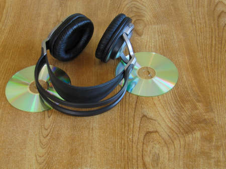 A set of headphones with some compact discsの写真素材
