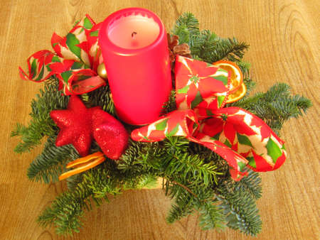 A christmas candle set in a festive displayの写真素材