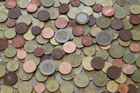 A large selection of used Euro coins の写真素材