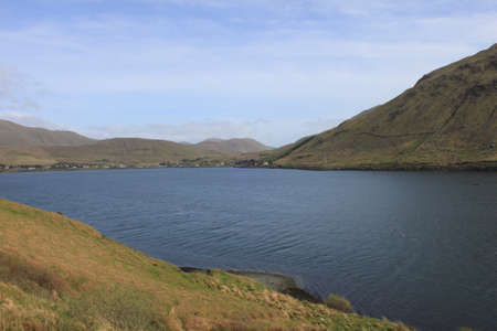 A view of Killary Fjord, Ireland with the village of Leenaneの写真素材