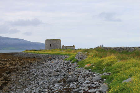 A photograph of the Martello Tower at Finavarra, County Clare, Ireland.の写真素材