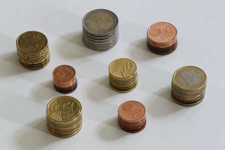 Stacks of Euro coins in various denominations の写真素材