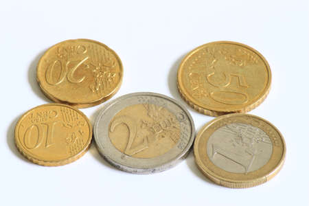 A selection of used Euro coins displayed side by side の写真素材