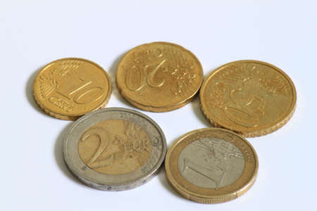 A selection of used Euro coins displayed side by side の写真素材