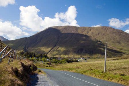 A view of a road approaching Leeane, Connemara, Co. Galway, Ireland.の写真素材