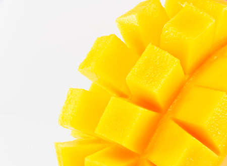 Yellow mango isolated on a white backgroundの写真素材